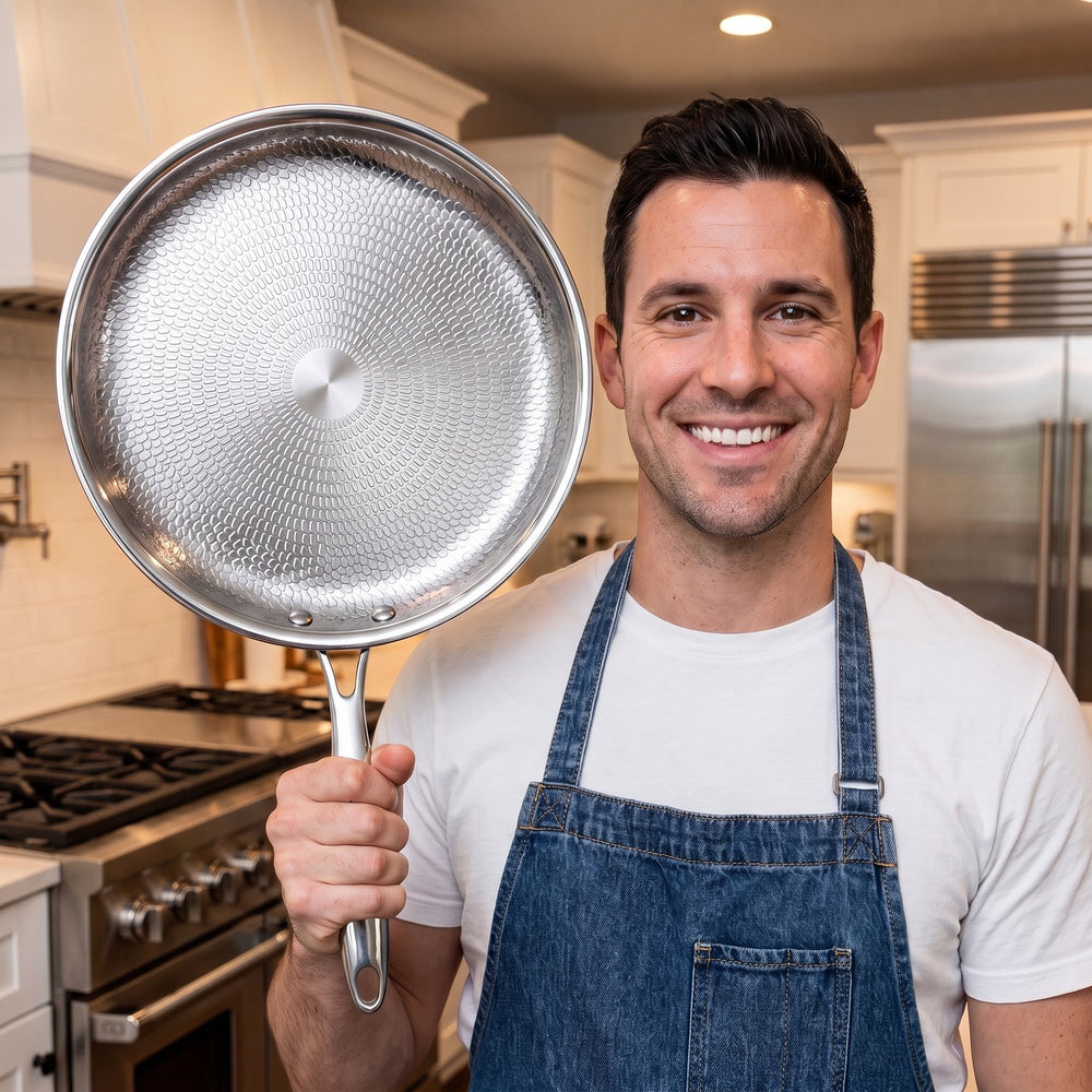 The founder of TitanPure holding the pan in his kitchen