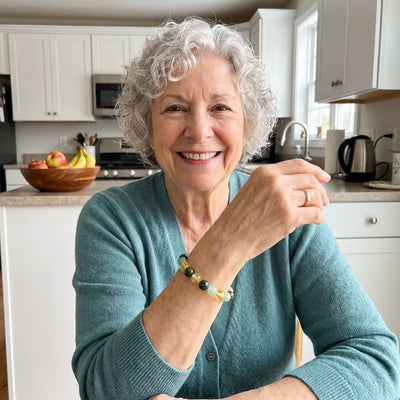 A customer wearing The Wealth Shift bracelet