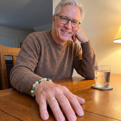 A customer wearing The Wealth Shift bracelet