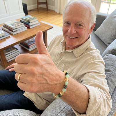 A customer wearing The Wealth Shift bracelet