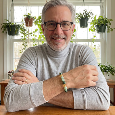 A customer wearing The Wealth Shift bracelet