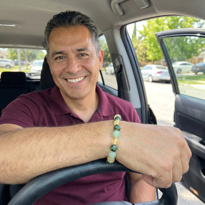 A customer wearing The Wealth Shift bracelet