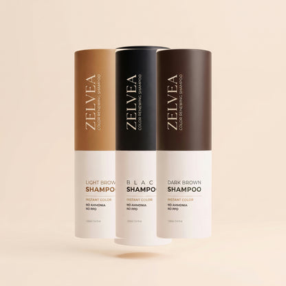 Three bottles of Zelvea Color Renewing Shampoo